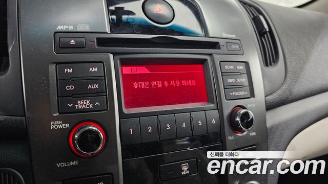 Kia Porte 2010 — photo 16