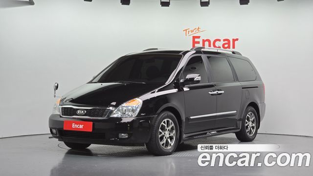 Kia Canival 2014 — photo 1