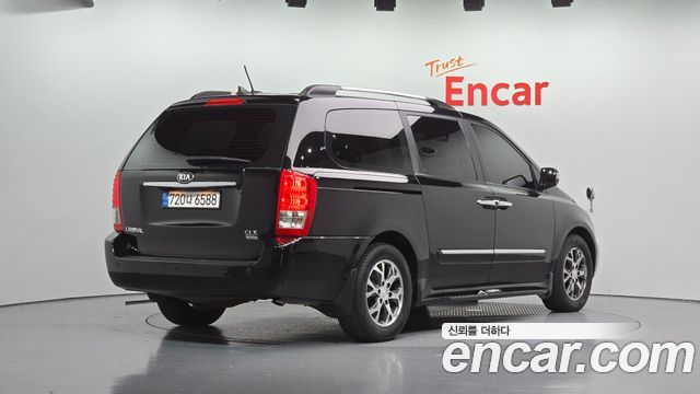 Kia Canival 2014 — photo 2