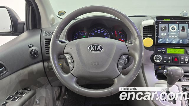 Kia Canival 2014 — photo 13