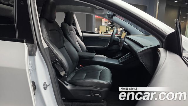 Tesla Model Y 2025 — photo 17