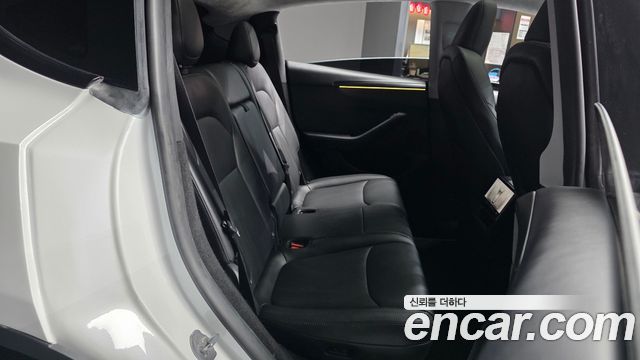 Tesla Model Y 2025 — photo 18
