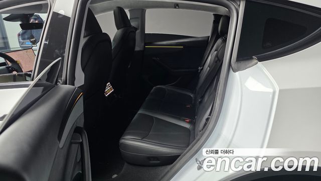 Tesla Model Y 2025 — photo 16