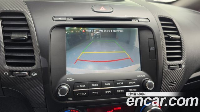 Kia K3 2015 — photo 21