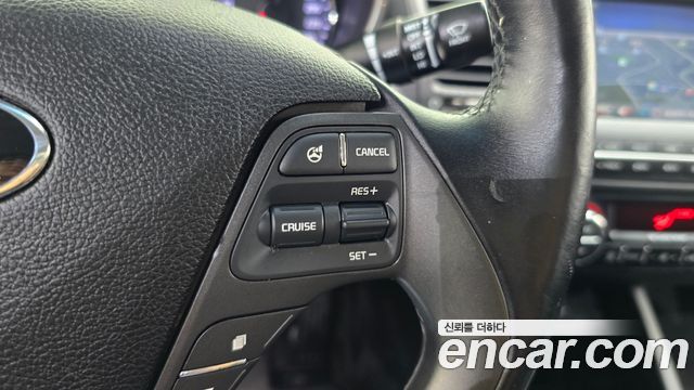 Kia K3 2015 — photo 23