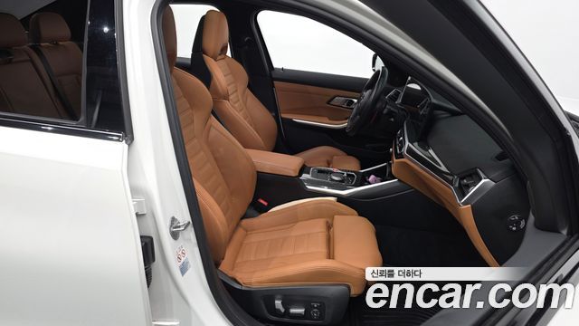 BMW 3-Series 2023 — photo 16