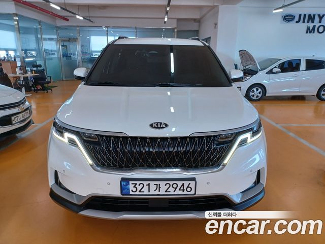 Kia Canival 2021 — photo 2