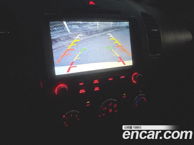 Kia K3 2015 — photo 14