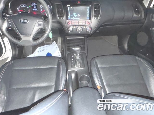 Kia K3 2015 — photo 17