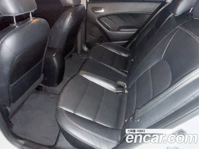 Kia K3 2015 — photo 19