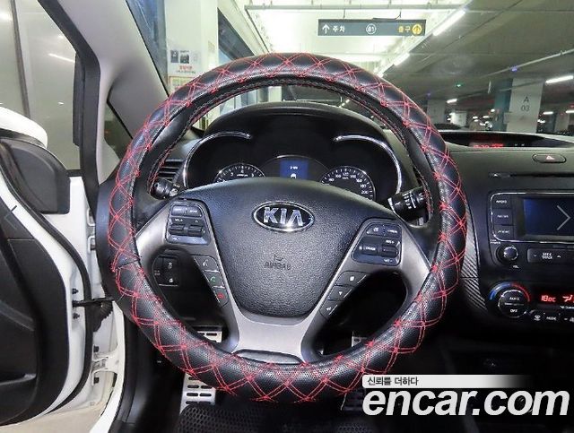 Kia K3 2013 — photo 8