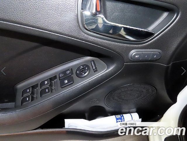 Kia K3 2013 — photo 13