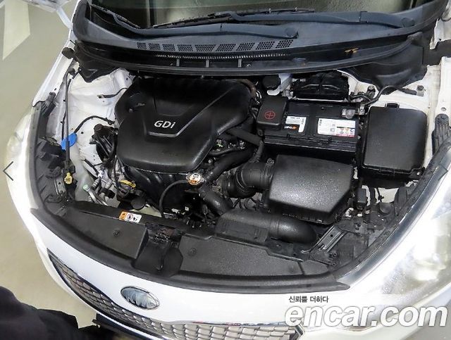 Kia K3 2013 — photo 17