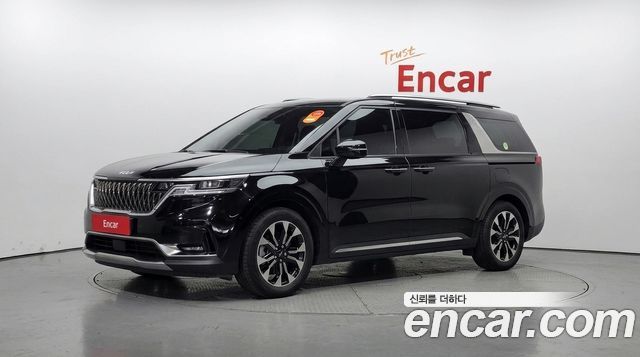 Kia Canival 2023 — photo 1
