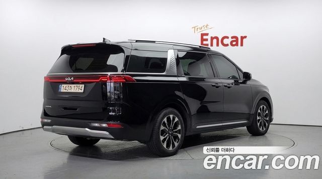 Kia Canival 2023 — photo 2