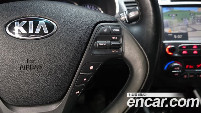 Kia K3 2015 — photo 24