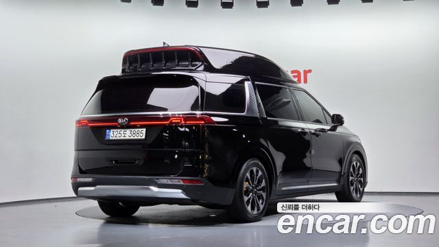 Kia Canival 2021 — photo 2
