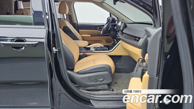 Kia Canival 2023 — photo 11