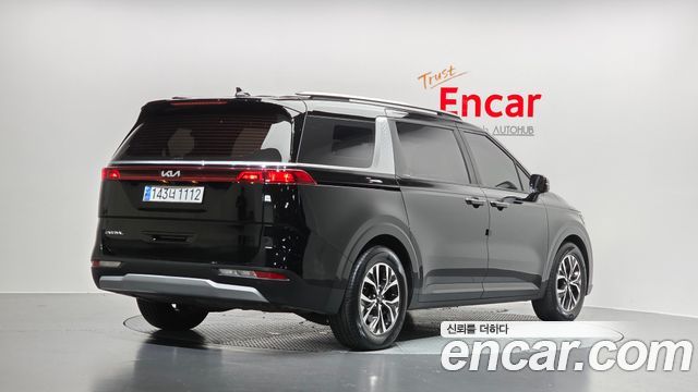 Kia Canival 2023 — photo 2