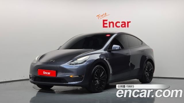 Tesla Model Y 2023 — photo 1