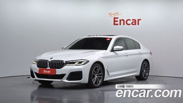 BMW 5-Series 2022 — photo 1