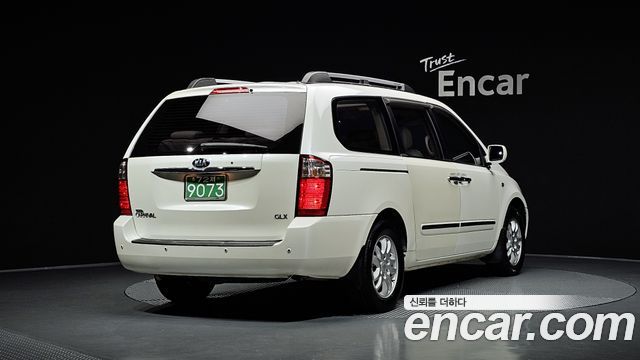 Kia Canival 2006 — photo 2