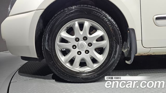 Kia Canival 2006 — photo 5