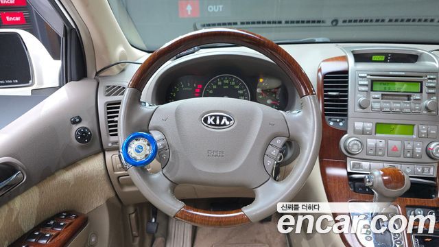 Kia Canival 2006 — photo 13