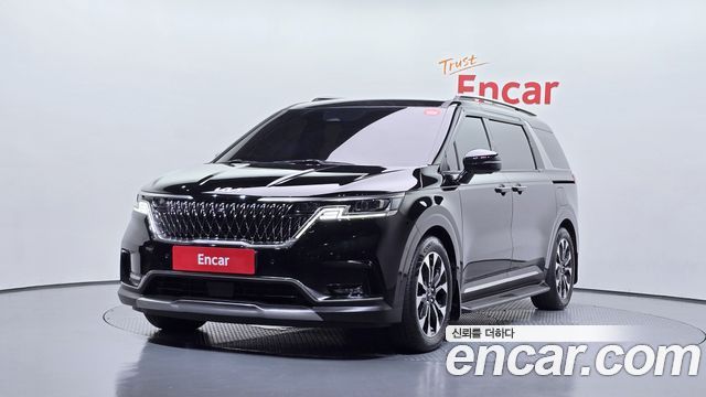 Kia Canival 2023 — photo 1
