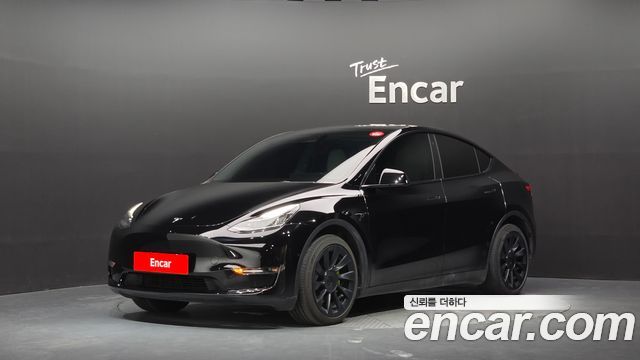 Tesla Model Y 2022 — photo 1