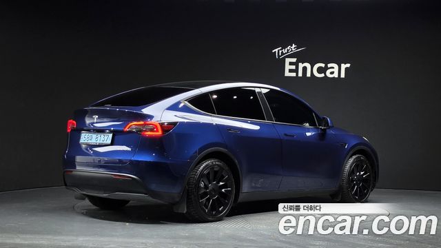 Tesla Model Y 2022 — photo 2