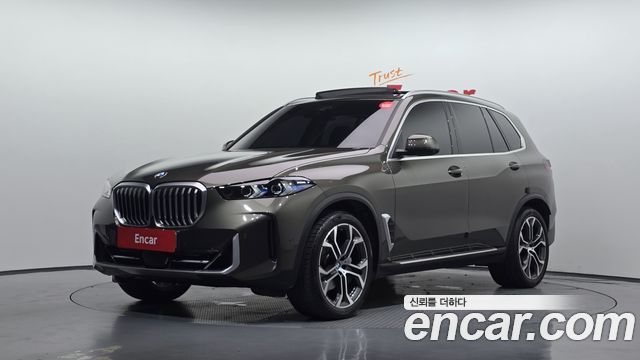 BMW X5 2024 — photo 1