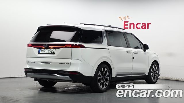 Kia Canival 2021 — photo 2