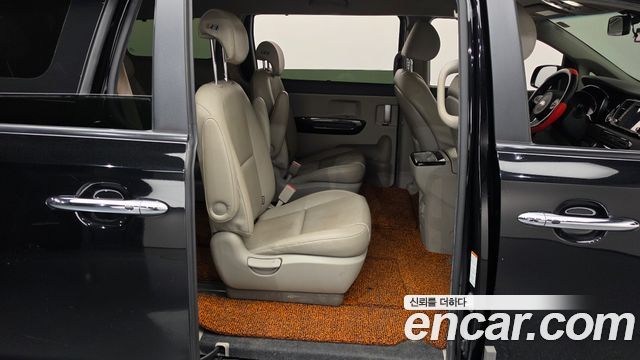 Kia Canival 2015 — photo 17