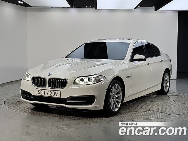 BMW 5-Series 2014 — photo 1