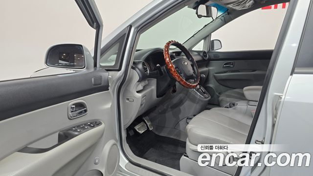 Kia Carens 2007 — photo 13