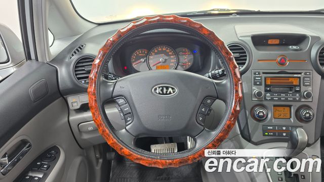 Kia Carens 2007 — photo 18