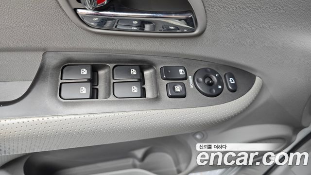 Kia Carens 2007 — photo 24