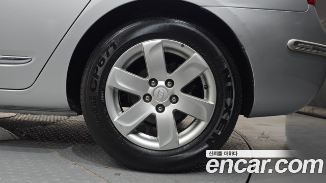 Kia Carens 2007 — photo 7
