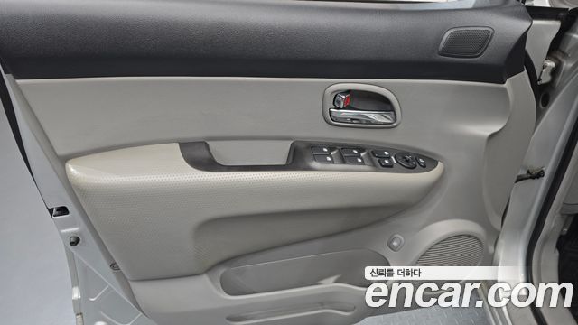 Kia Carens 2007 — photo 14