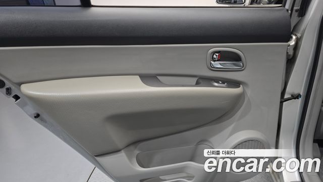 Kia Carens 2007 — photo 15