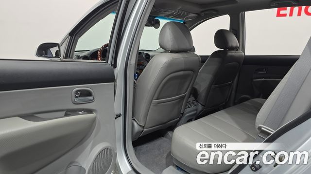 Kia Carens 2007 — photo 28