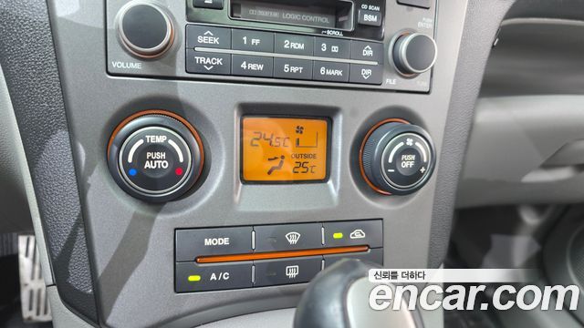Kia Carens 2007 — photo 29