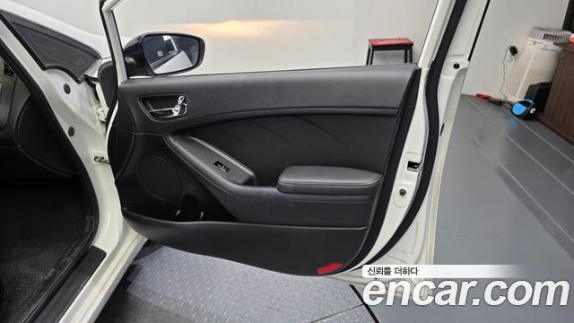 Kia K3 2015 — photo 14