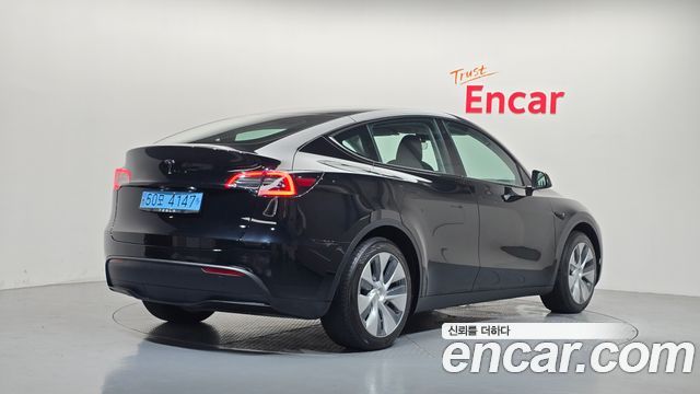 Tesla Model Y 2023 — photo 2