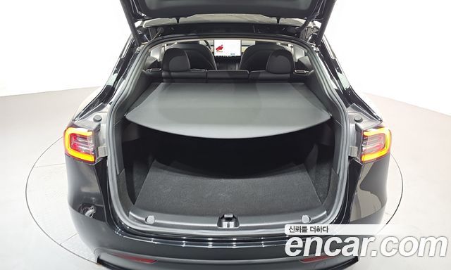 Tesla Model Y 2023 — photo 15