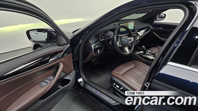 BMW 5-Series 2023 — photo 17