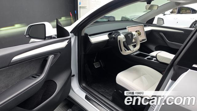 Tesla Model Y 2024 — photo 13