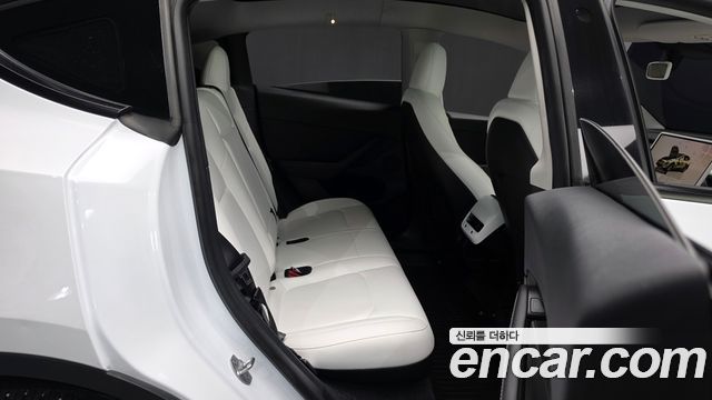 Tesla Model Y 2024 — photo 17