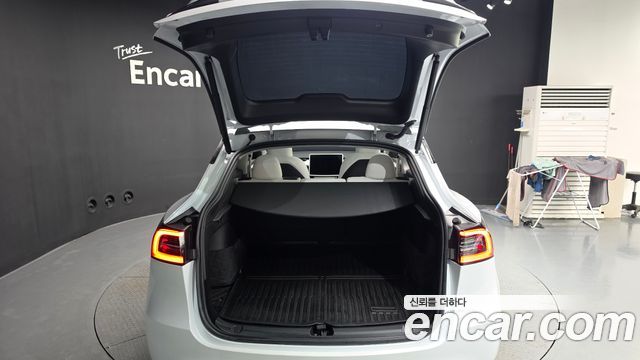 Tesla Model Y 2024 — photo 26